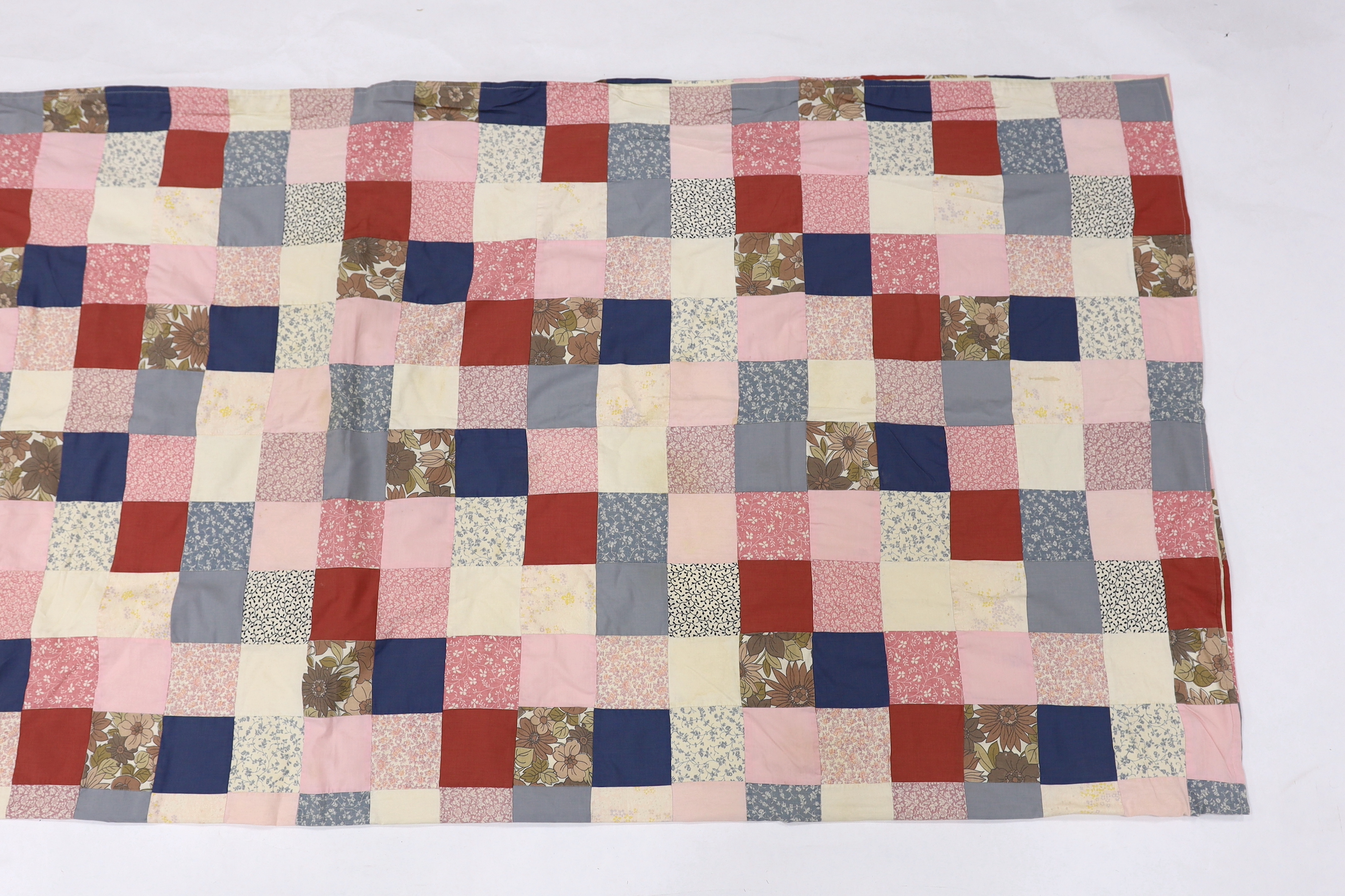 A patchwork bedcover, designed with Laura Ashley, 20th century fabrics, 215cm x 215cm sq.